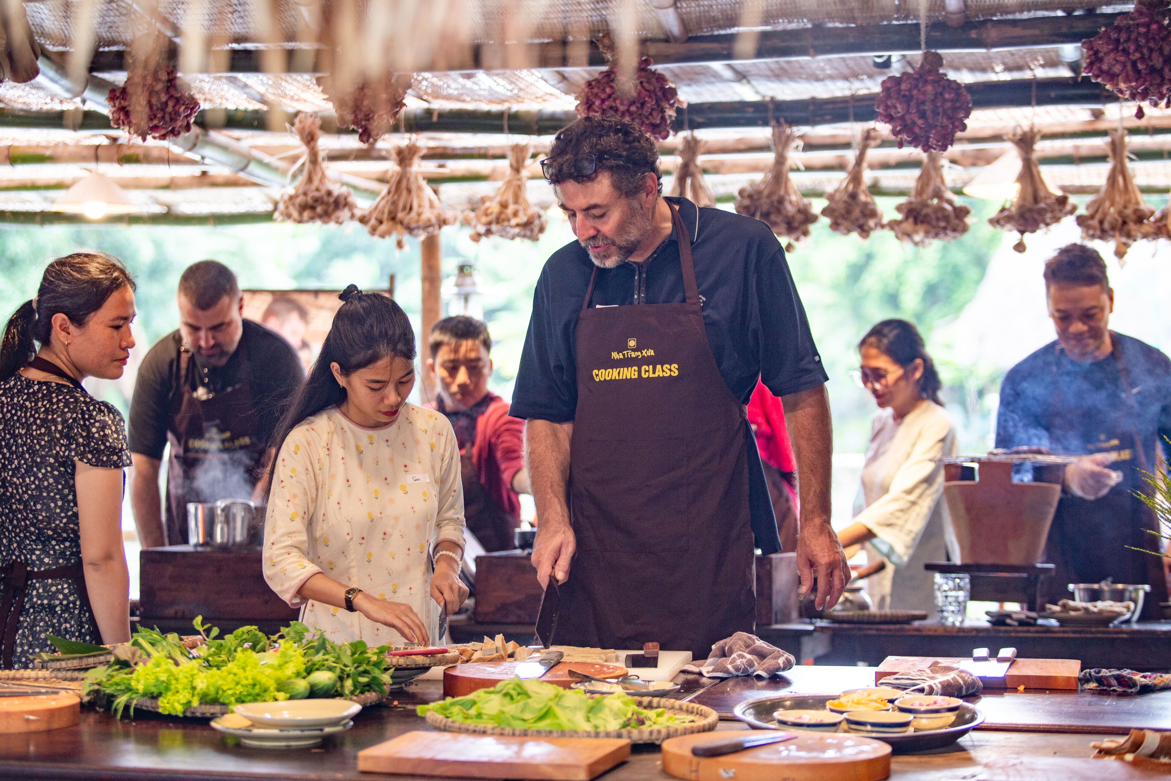 Cooking local dishes with guidance from a native chef